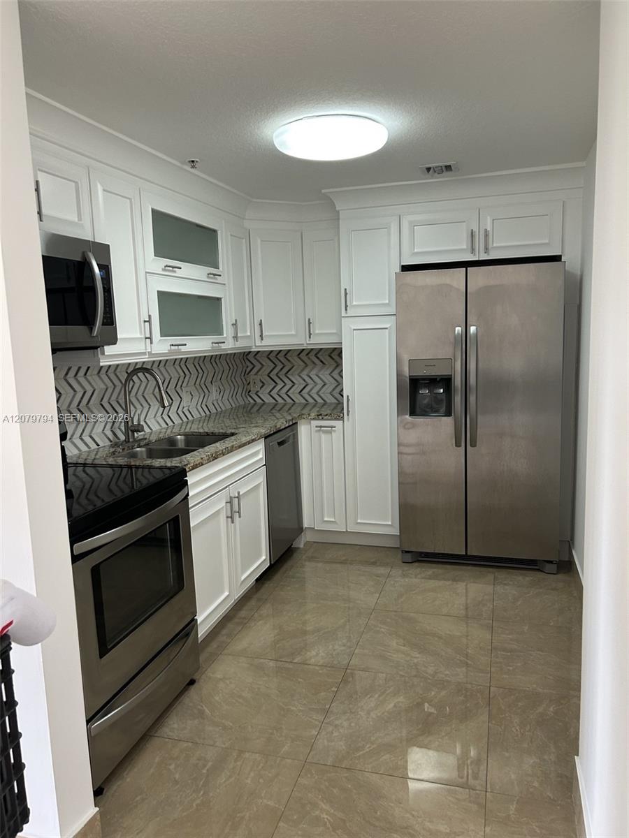 5271 SW 8th St # 313 — Photo 3