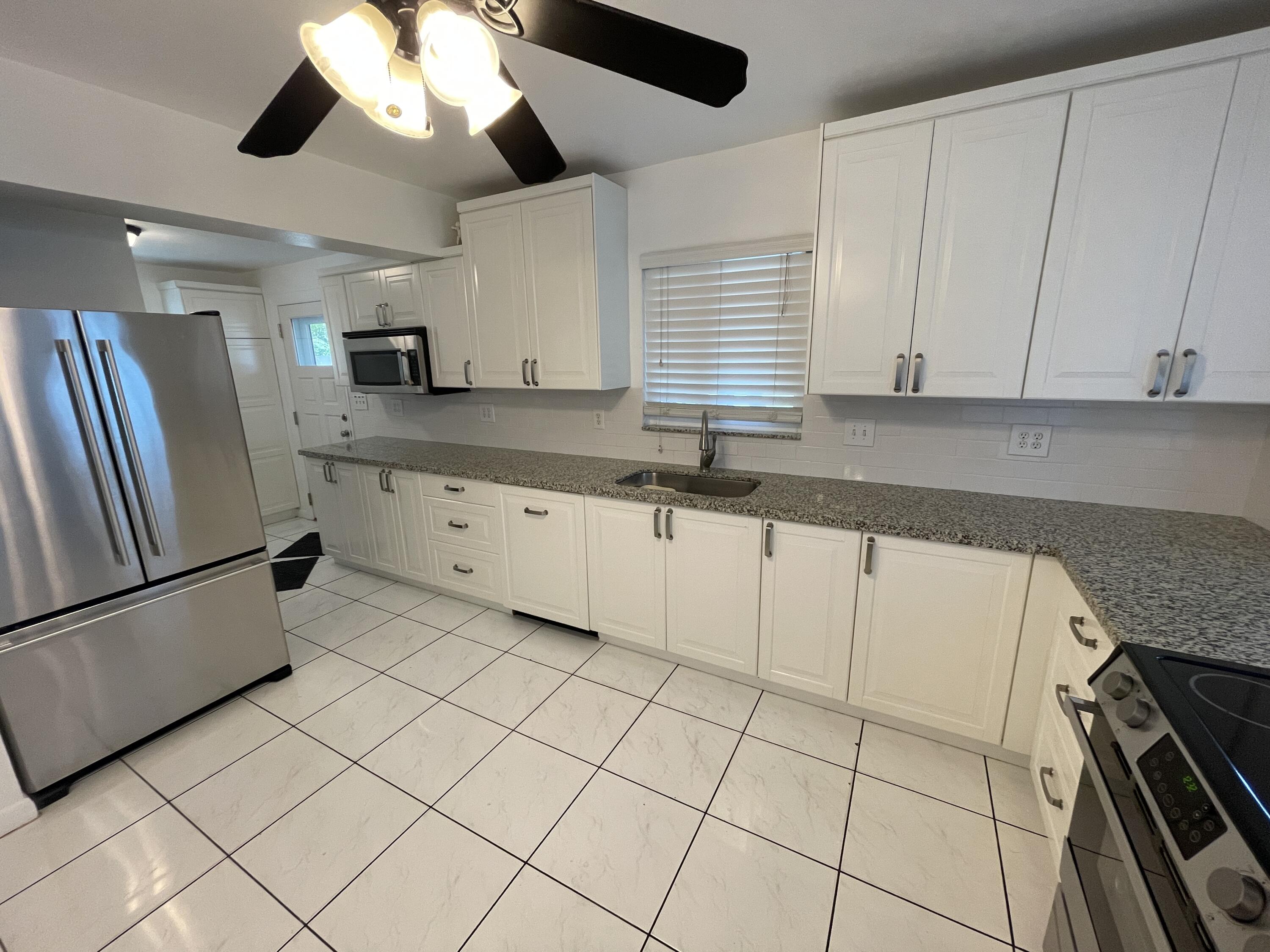 845 NW 10TH Avenue — Photo 2