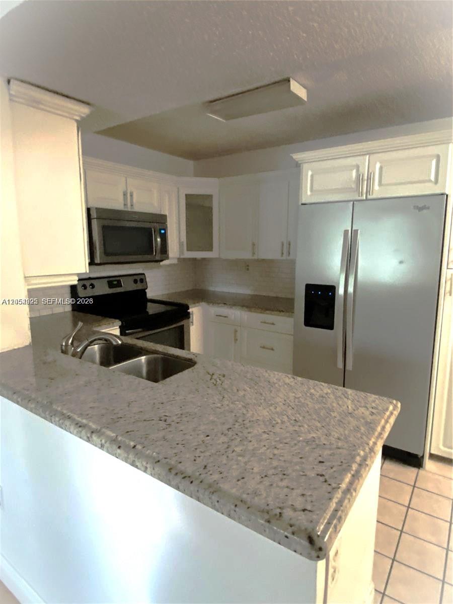 300 W Palm Cir W # 208, Pembroke Pines FL 33025
