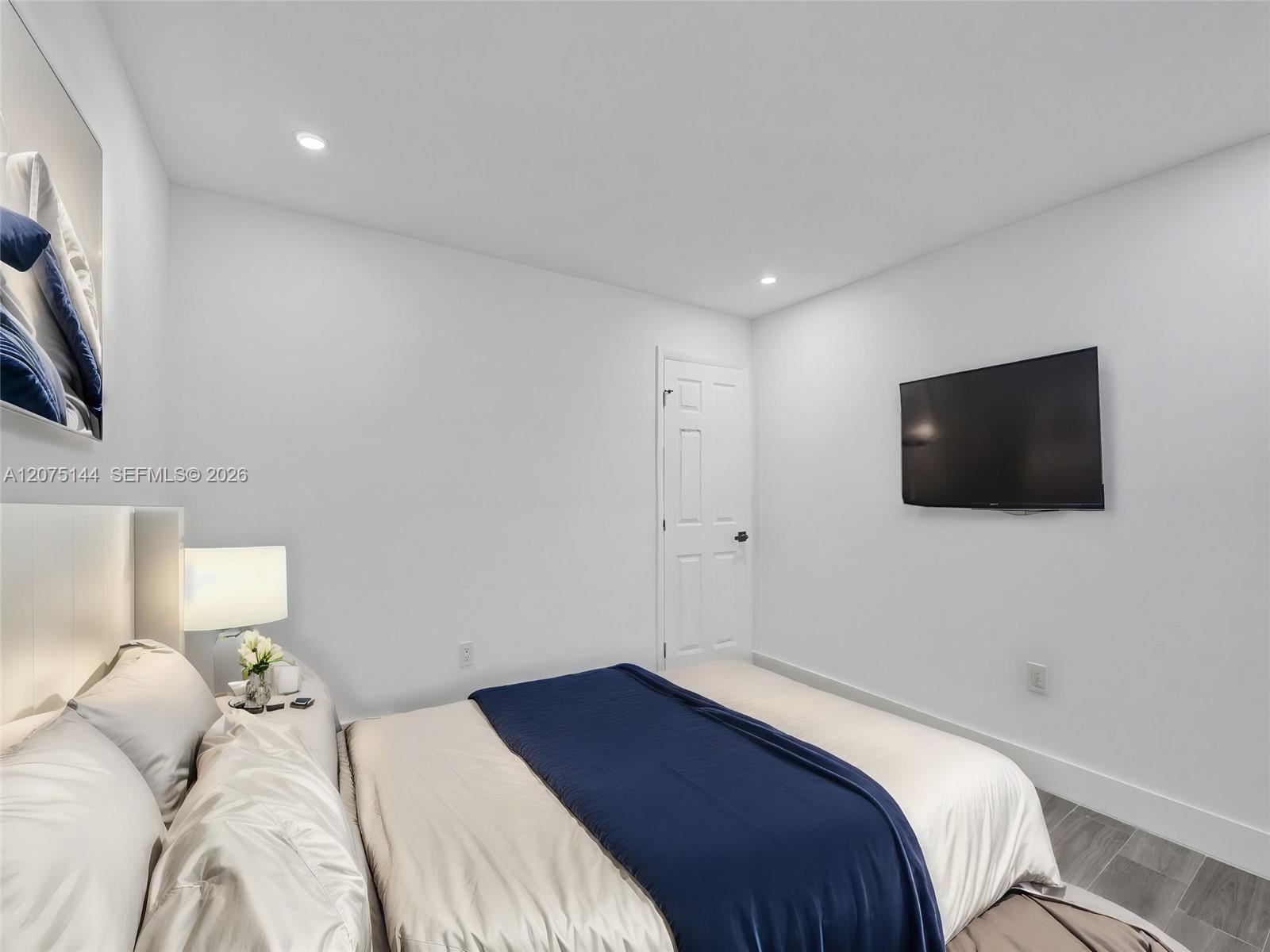 The unit is UNFURNISHED- This photo is VIRTUAL STAGED FOR VISUALIZATION