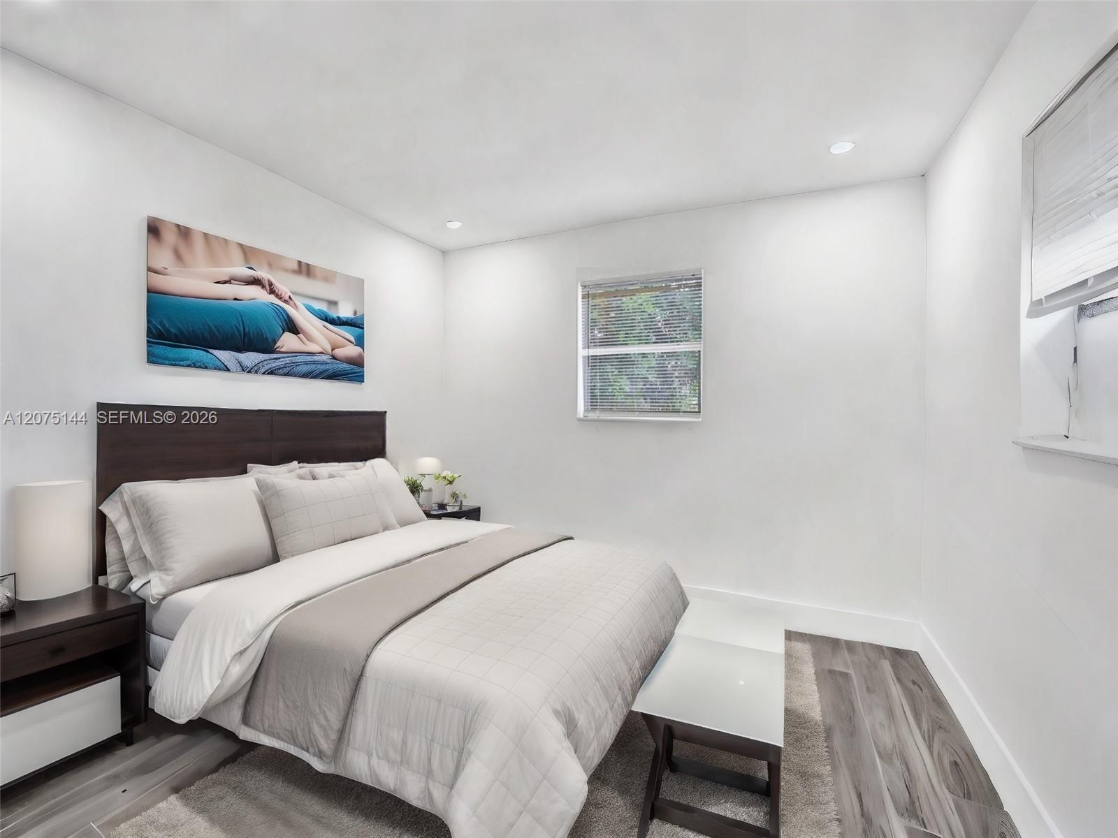 The unit is UNFURNISHED- This photo is VIRTUAL STAGED FOR VISUALIZATION