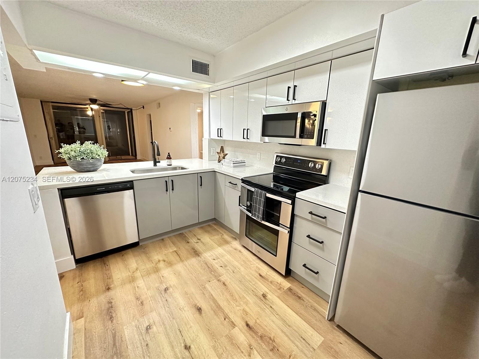 202 Lake Pointe Dr # 104 — Photo 3