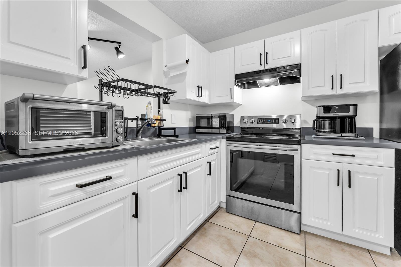 8720 N Sherman Cir # 101 — Photo 2