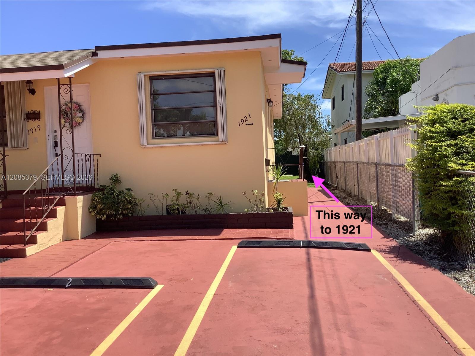 1921 is the building in the back of this triplex property
