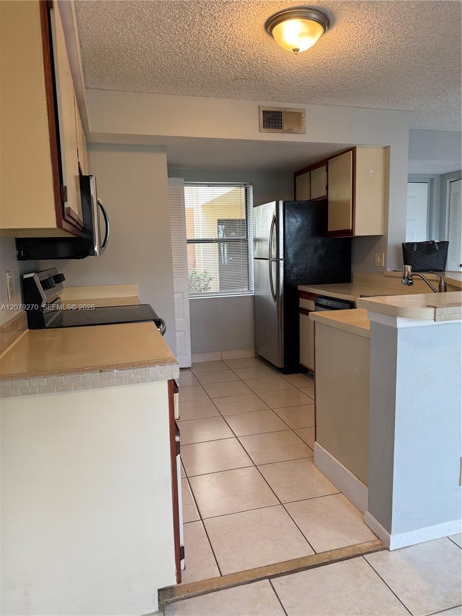 9999 Summerbreeze Dr # 119 — Photo 3