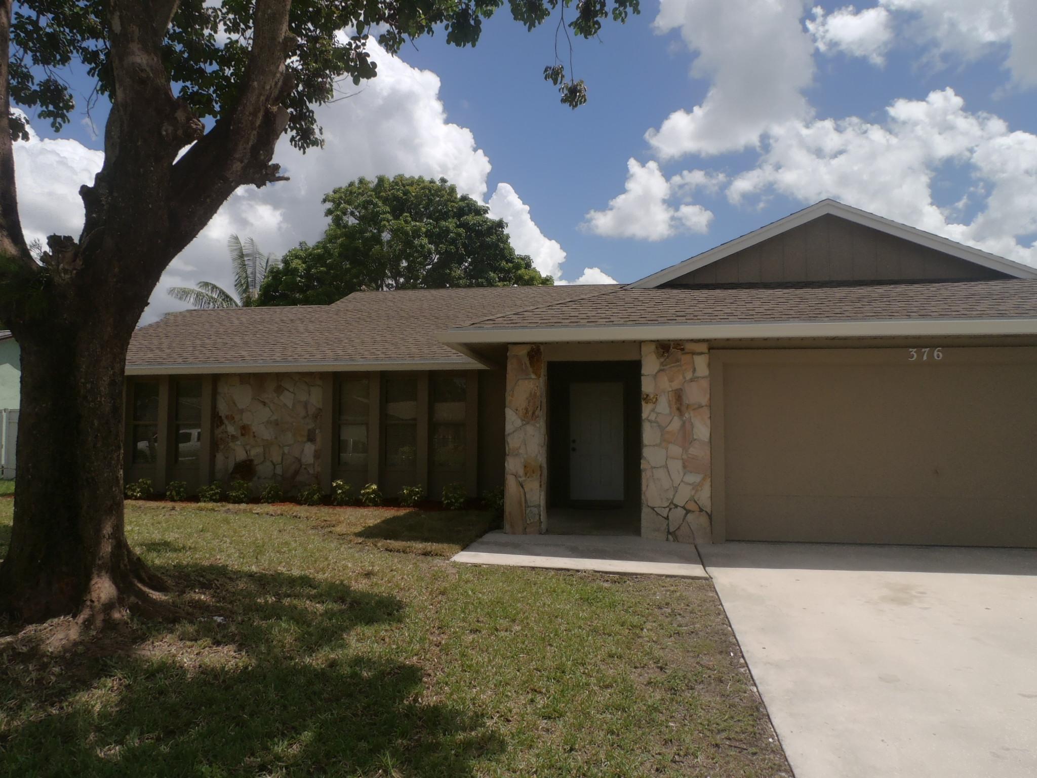 376 La Mancha Avenue, Royal Palm Beach FL 33411