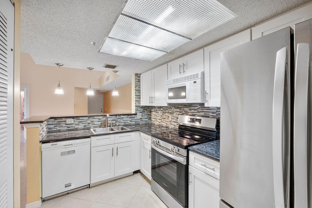5011 Wiles Road Unit 303, Coconut Creek FL 33073