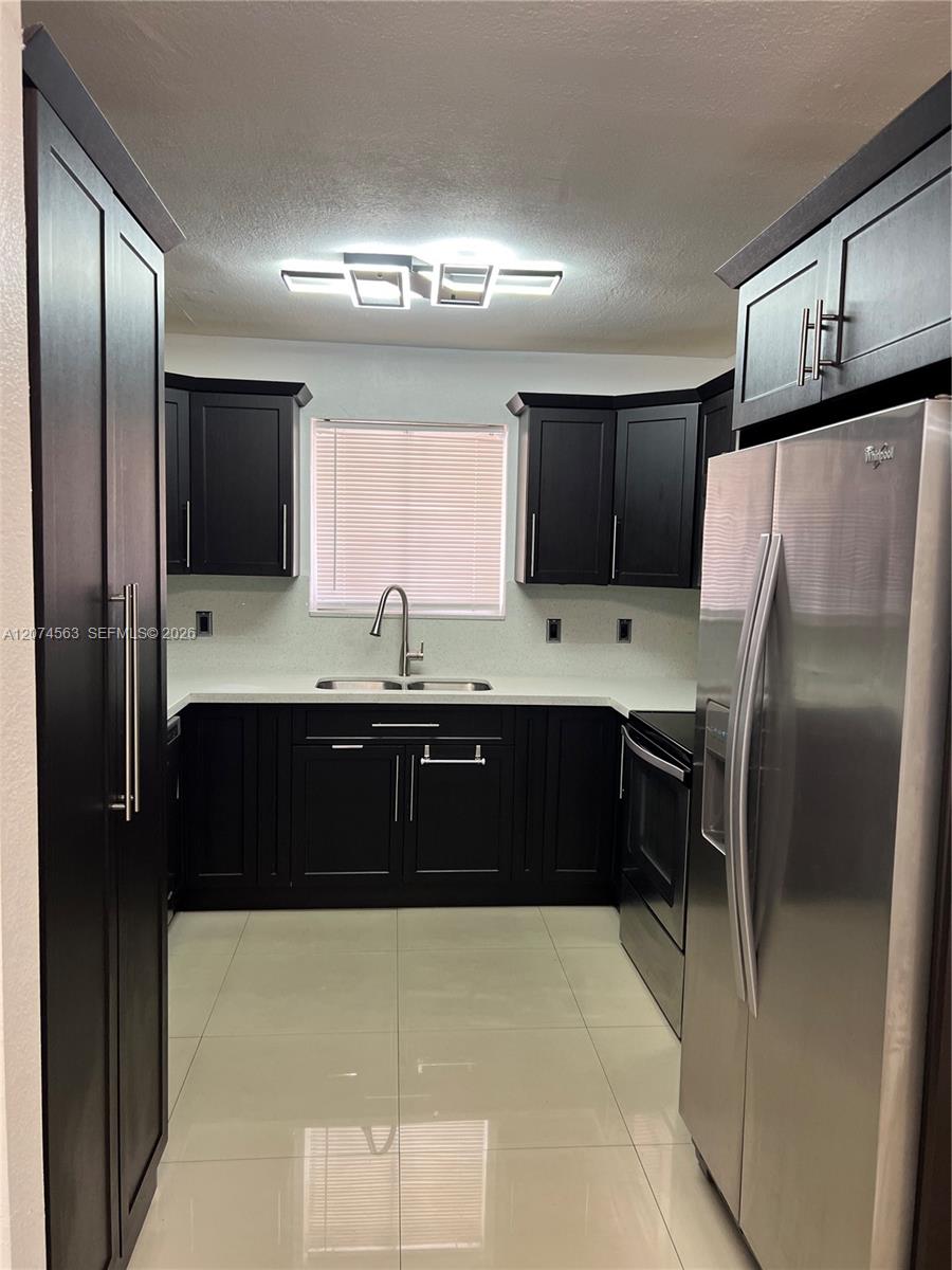7785 W 30th Ct # 107 — Photo 3