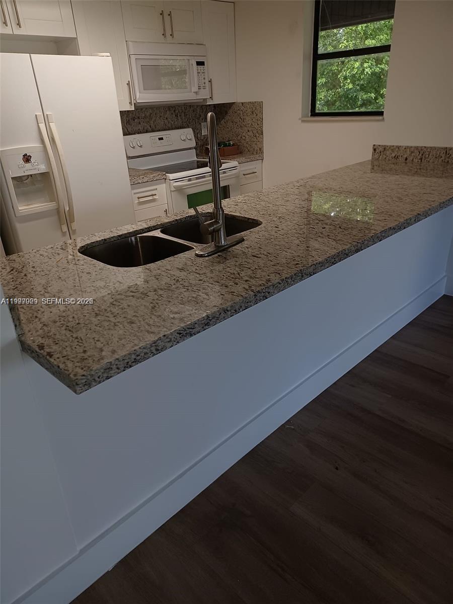 16220 NW 2nd Ave # 411, Miami FL 33169