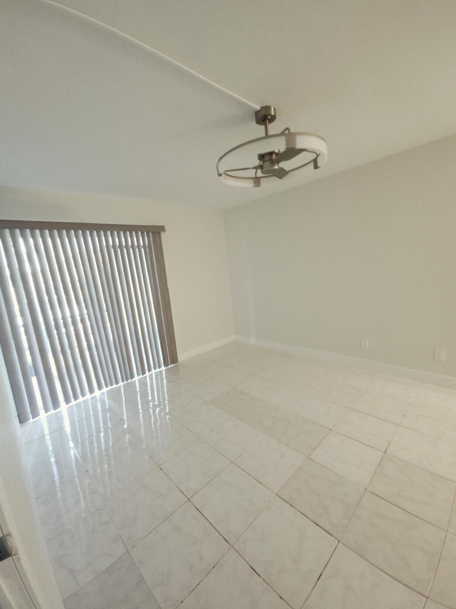 10035 WINDING LAKE Road # 102 — Photo 5