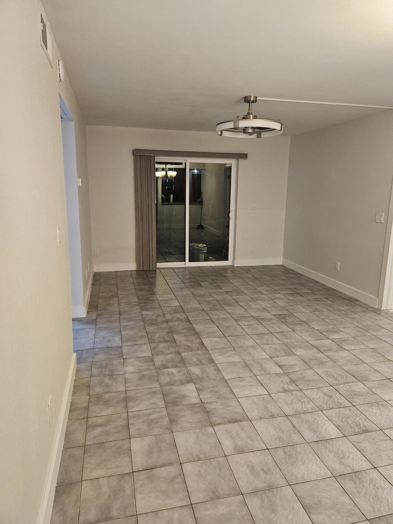 10035 WINDING LAKE Road # 102 — Photo 4