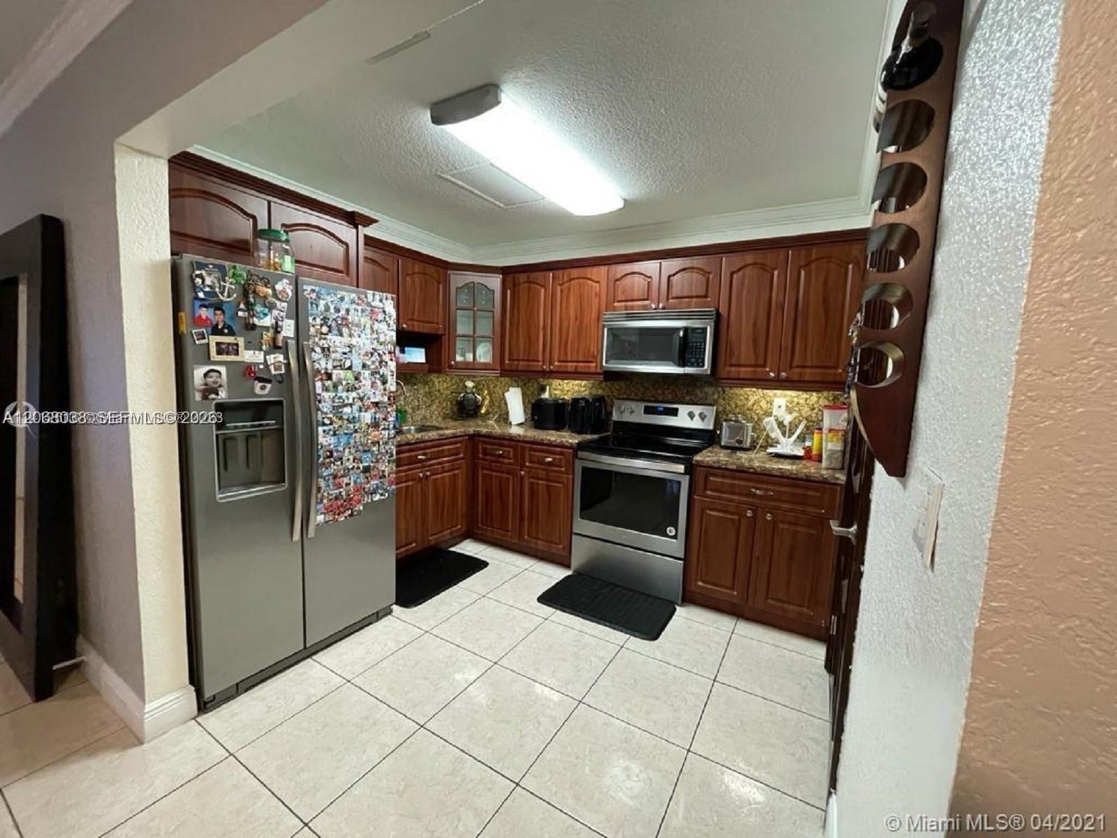 12860 SW 43rd Dr # B — Photo 2