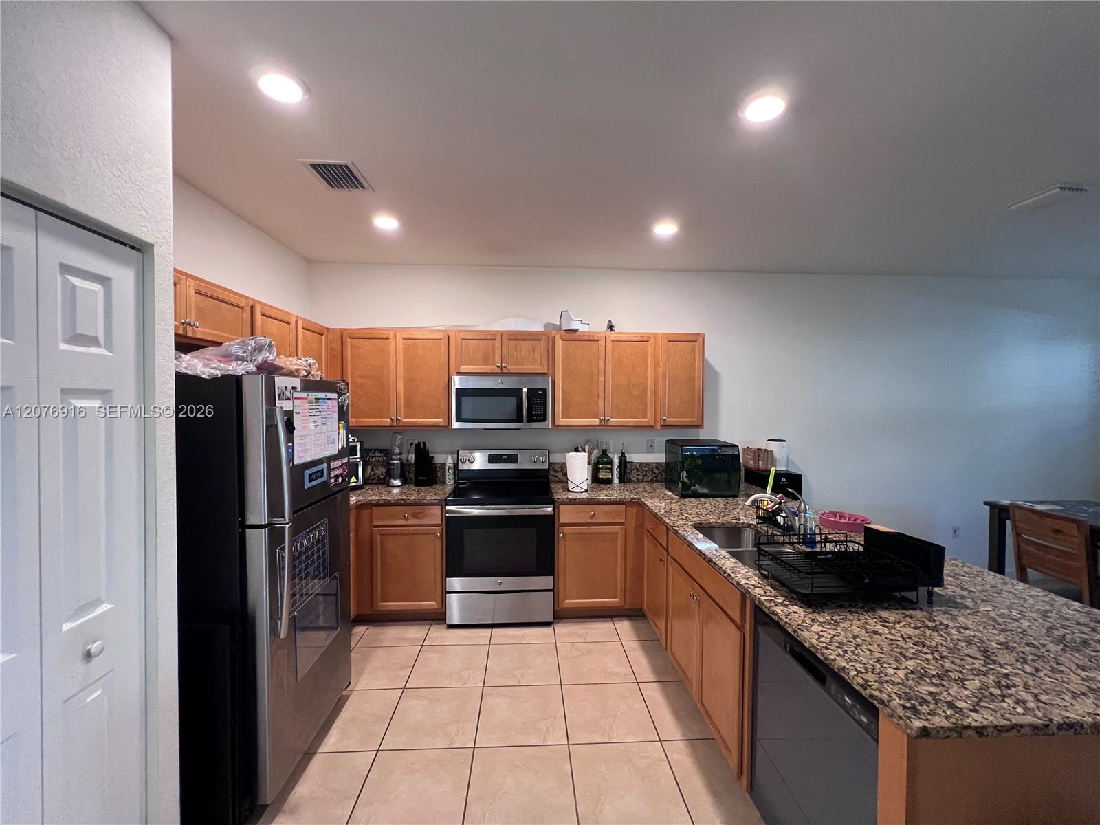 9335 W 33rd Ave — Photo 3