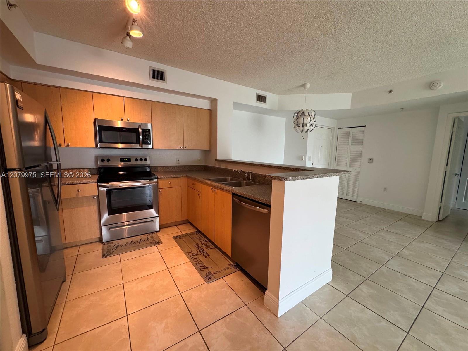 7920 N Nob Hill Rd # 103 — Photo 3
