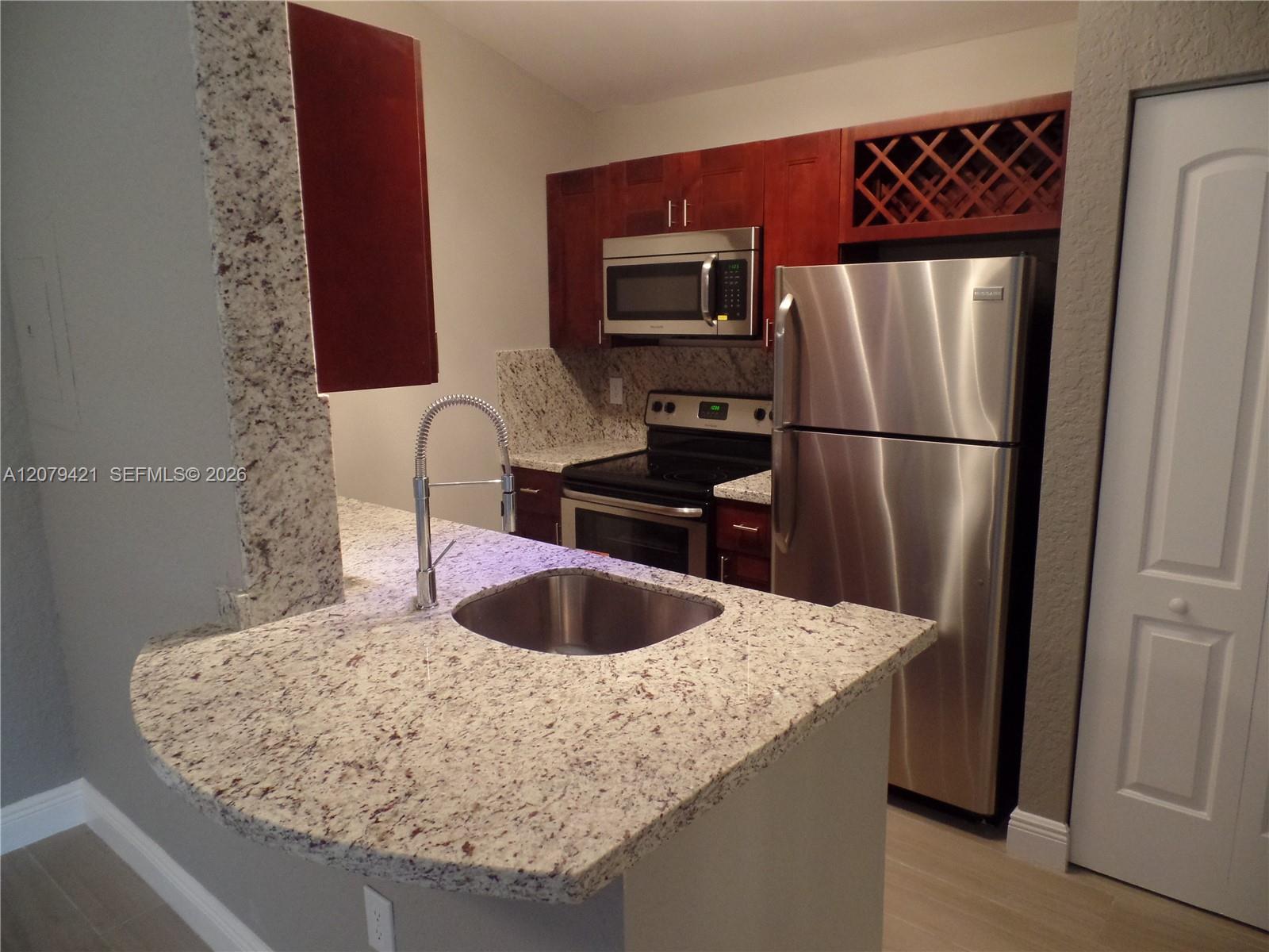 2881 N Oakland Forest Dr # 311 — Photo 2