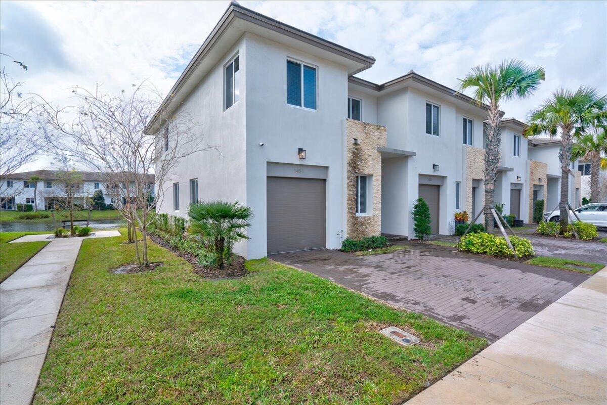1451 Pioneer Way, Royal Palm Beach FL 33411