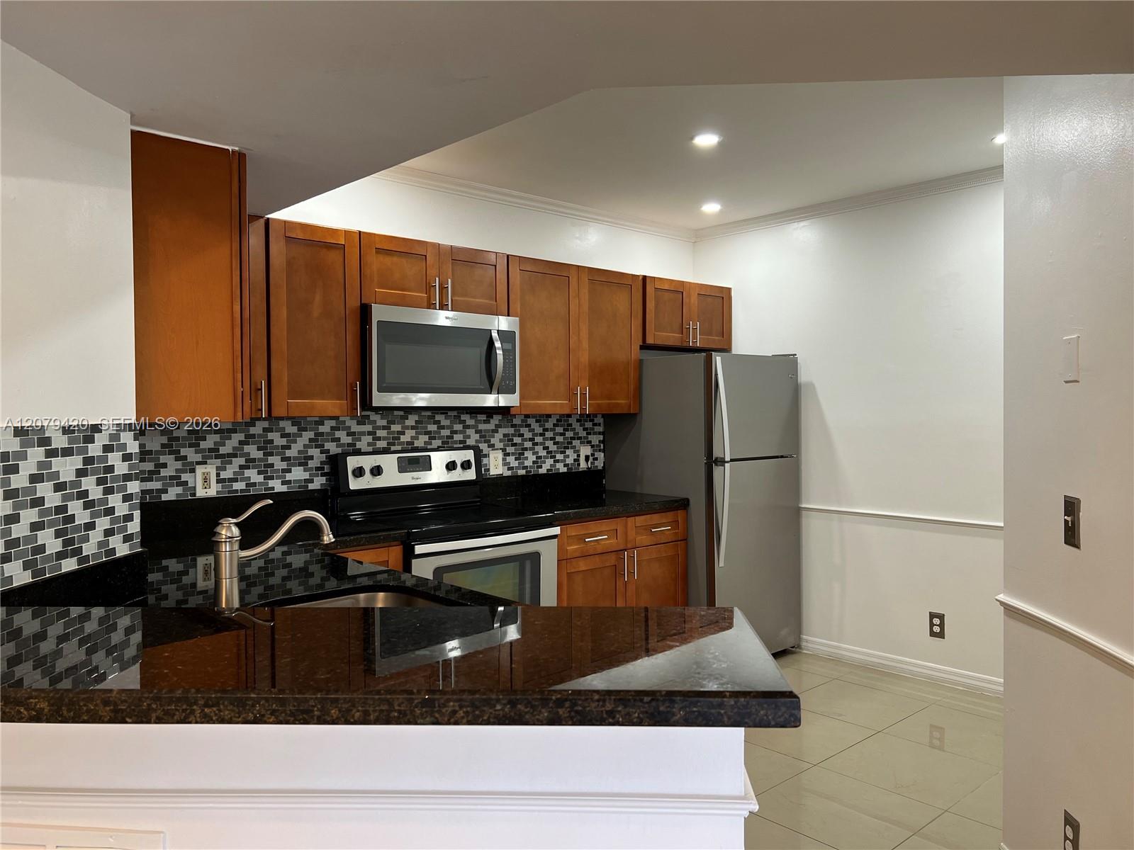 8721 Wiles Rd # 306 — Photo 3