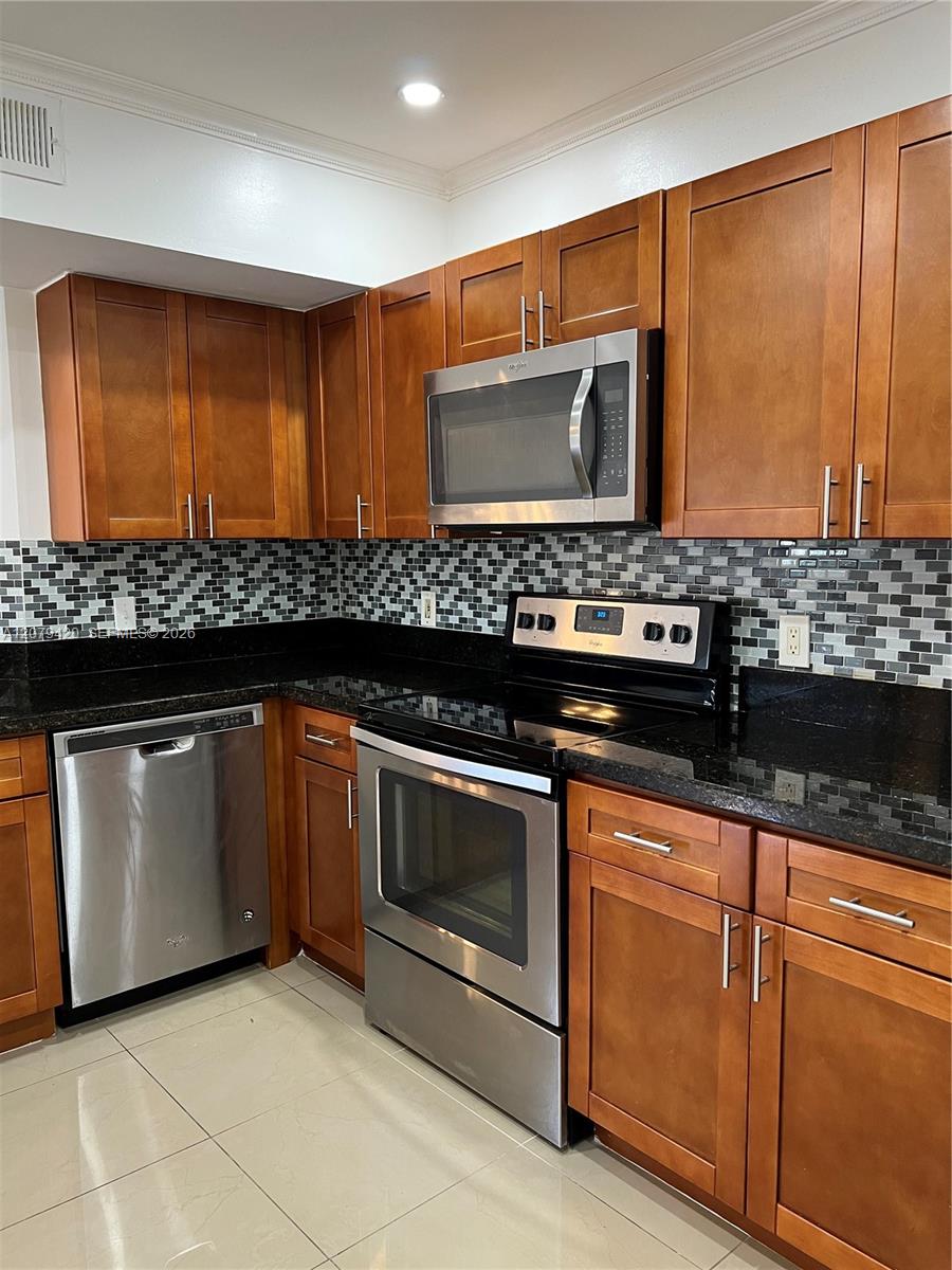 8721 Wiles Rd # 306 — Photo 4