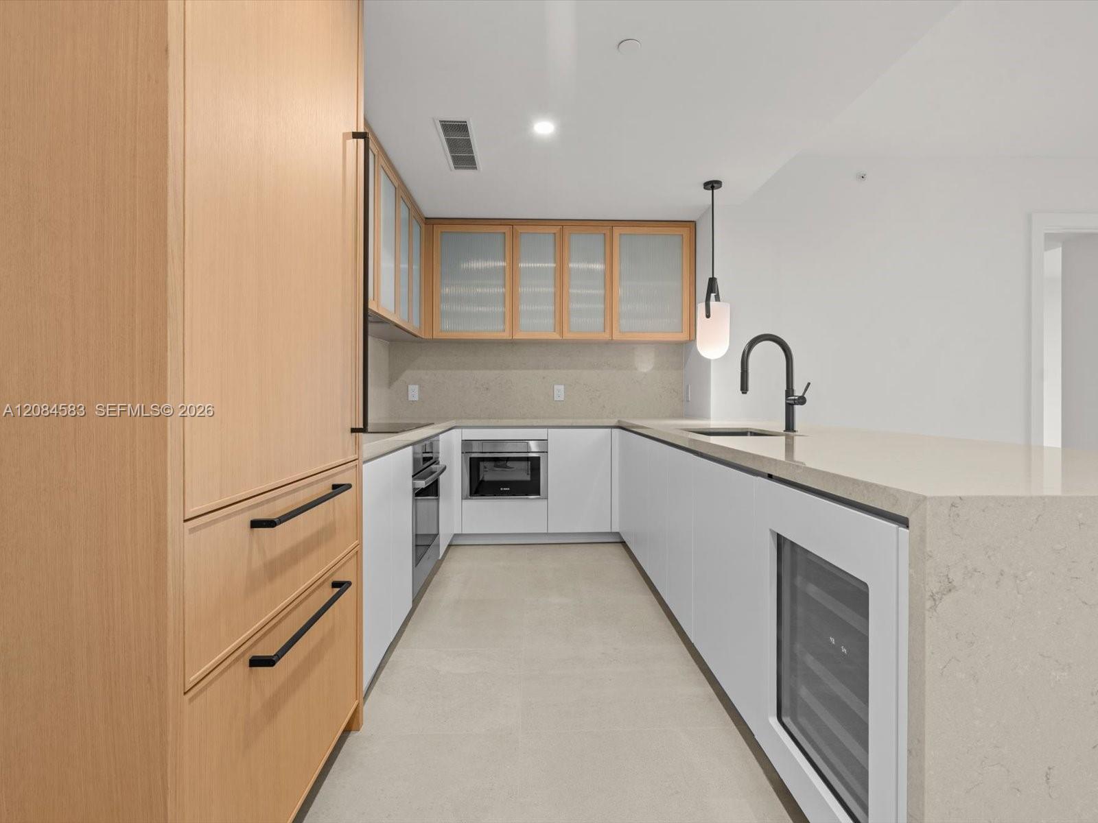 Kitchen island with  built in wine cooler