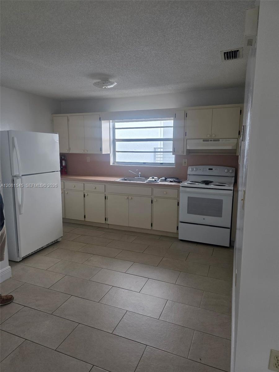 1575 NW 1st St # 3 — Photo 4