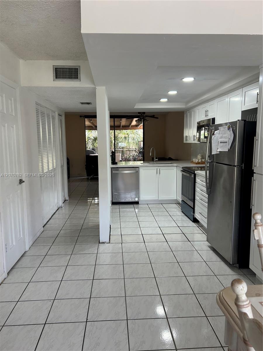 12242 SW 16th Ter # L — Photo 2