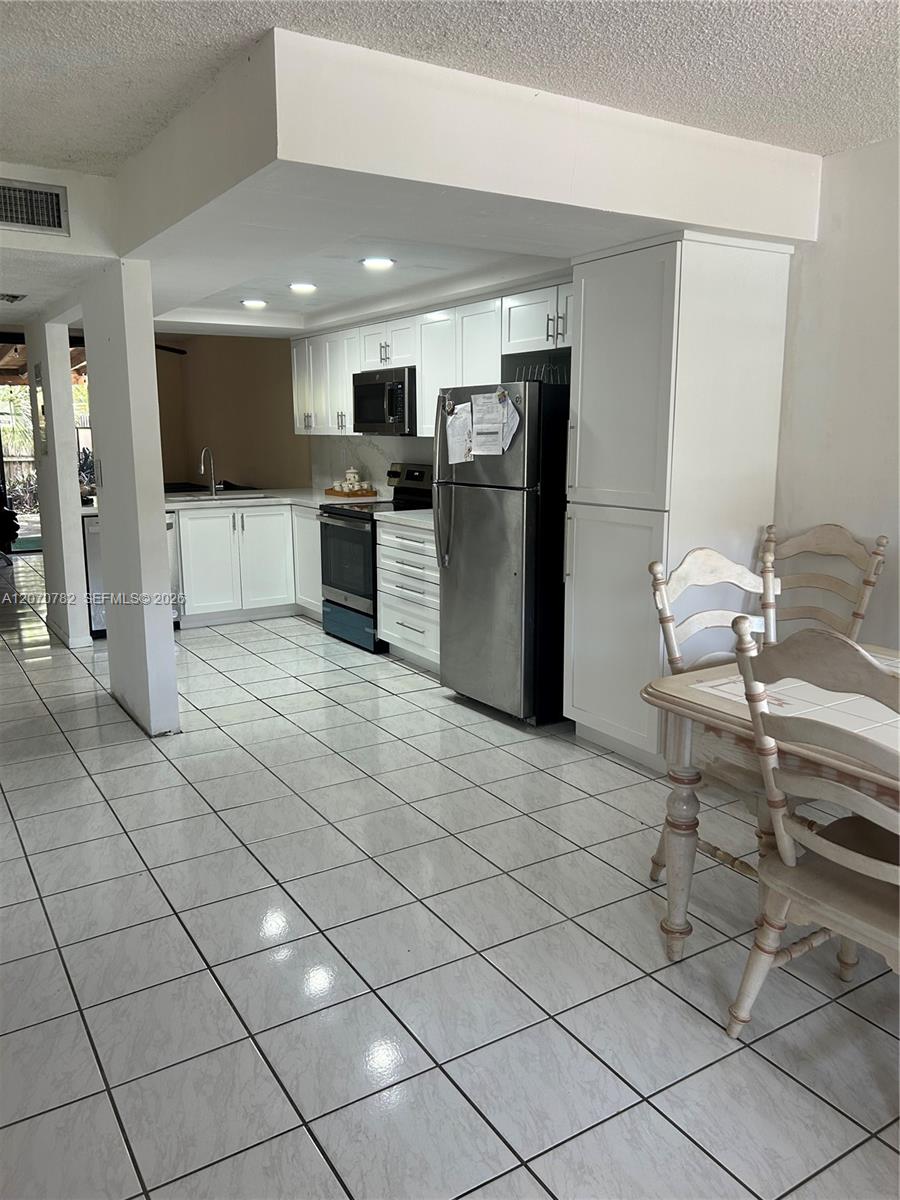 12242 SW 16th Ter # L — Photo 3
