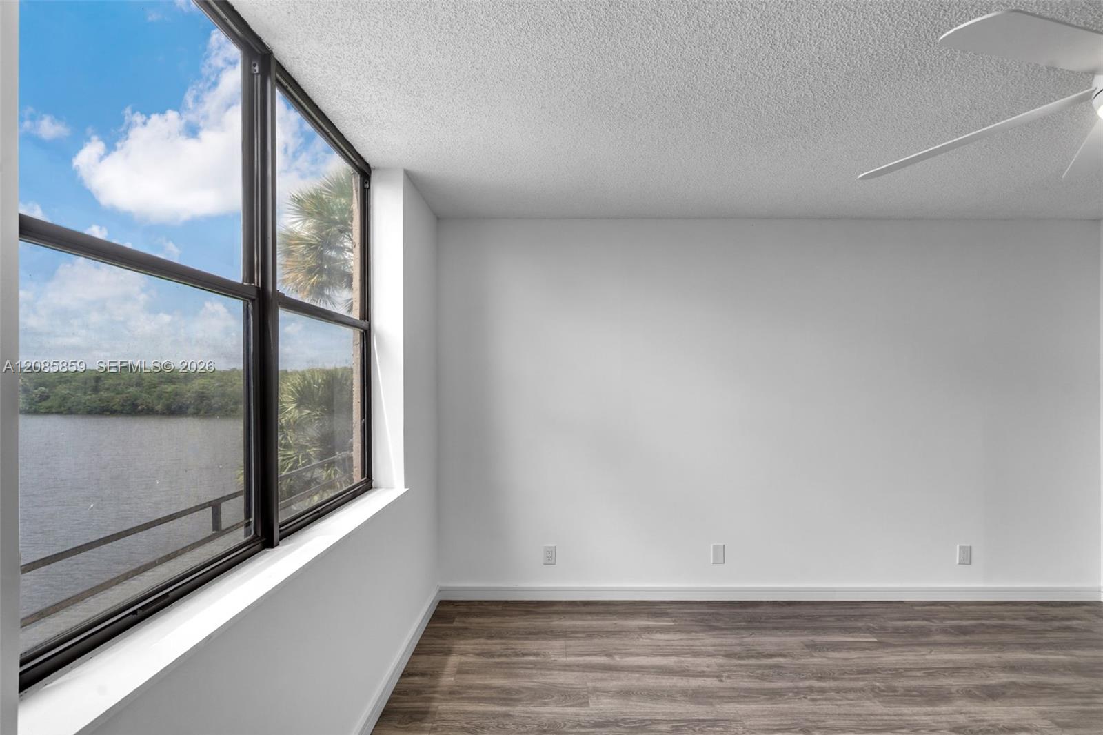 Wake up to peace and privacy! Enjoy breathtaking, tranquil lake views directly from your primary bedroom window.
