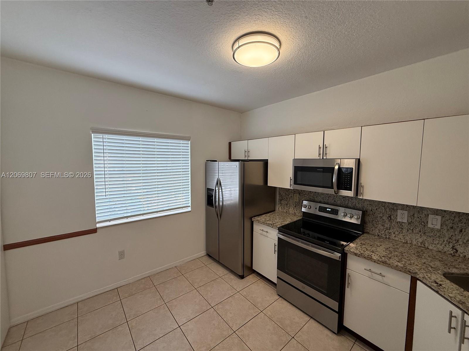 5620 NW 114 Path # 201 — Photo 3