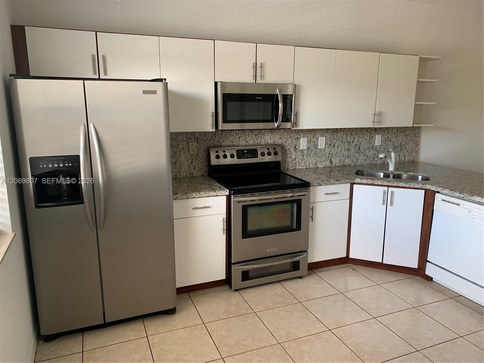 5620 NW 114 Path # 201 — Photo 5