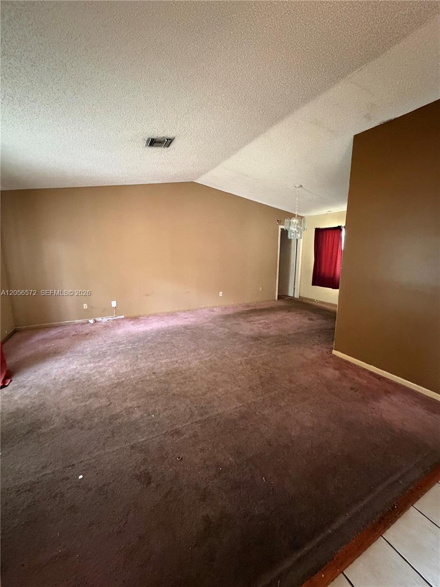 9840 NW 25th Ct — Photo 2