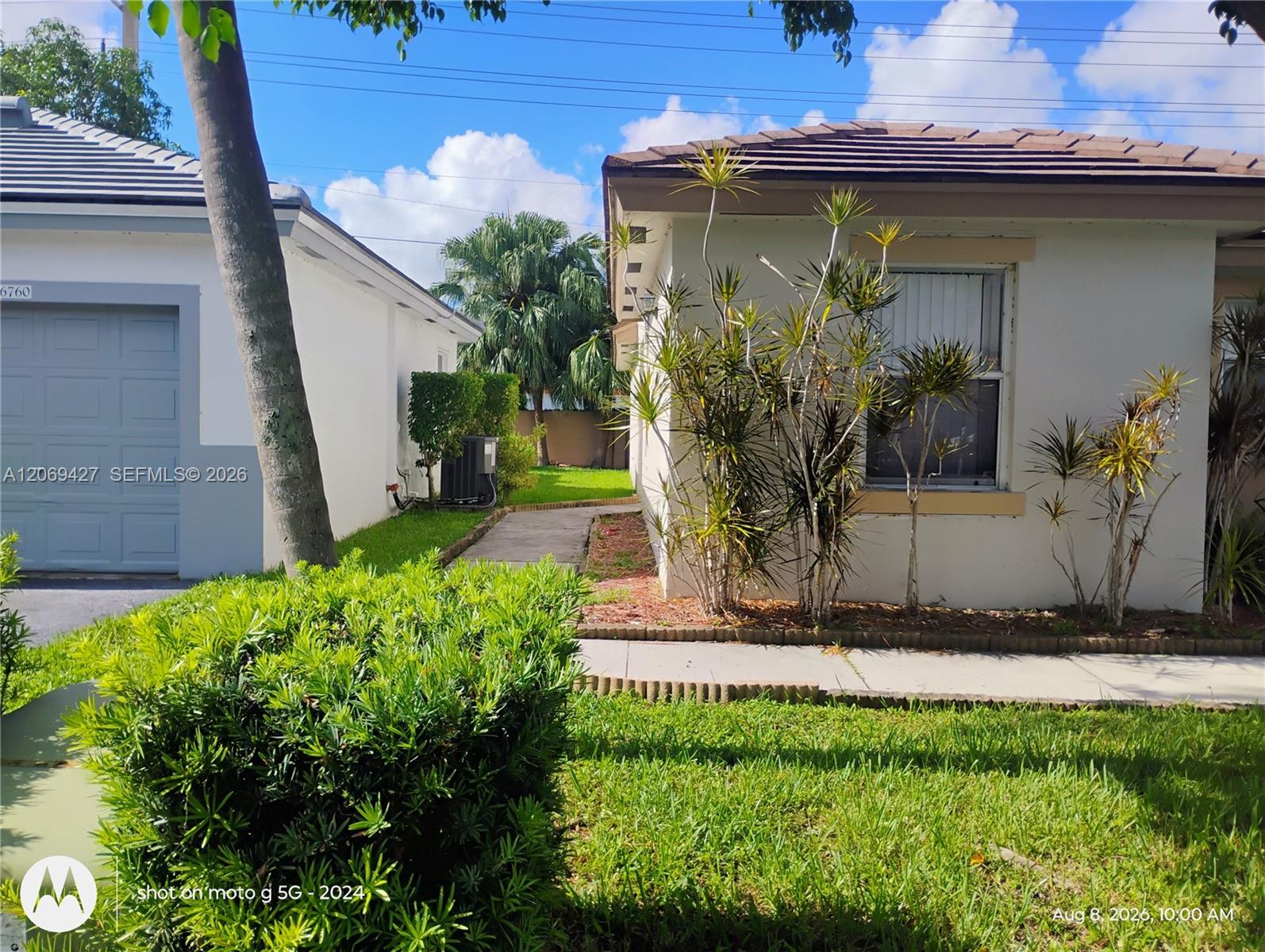 6766 NW 69th Ct # 6766 — Photo 2