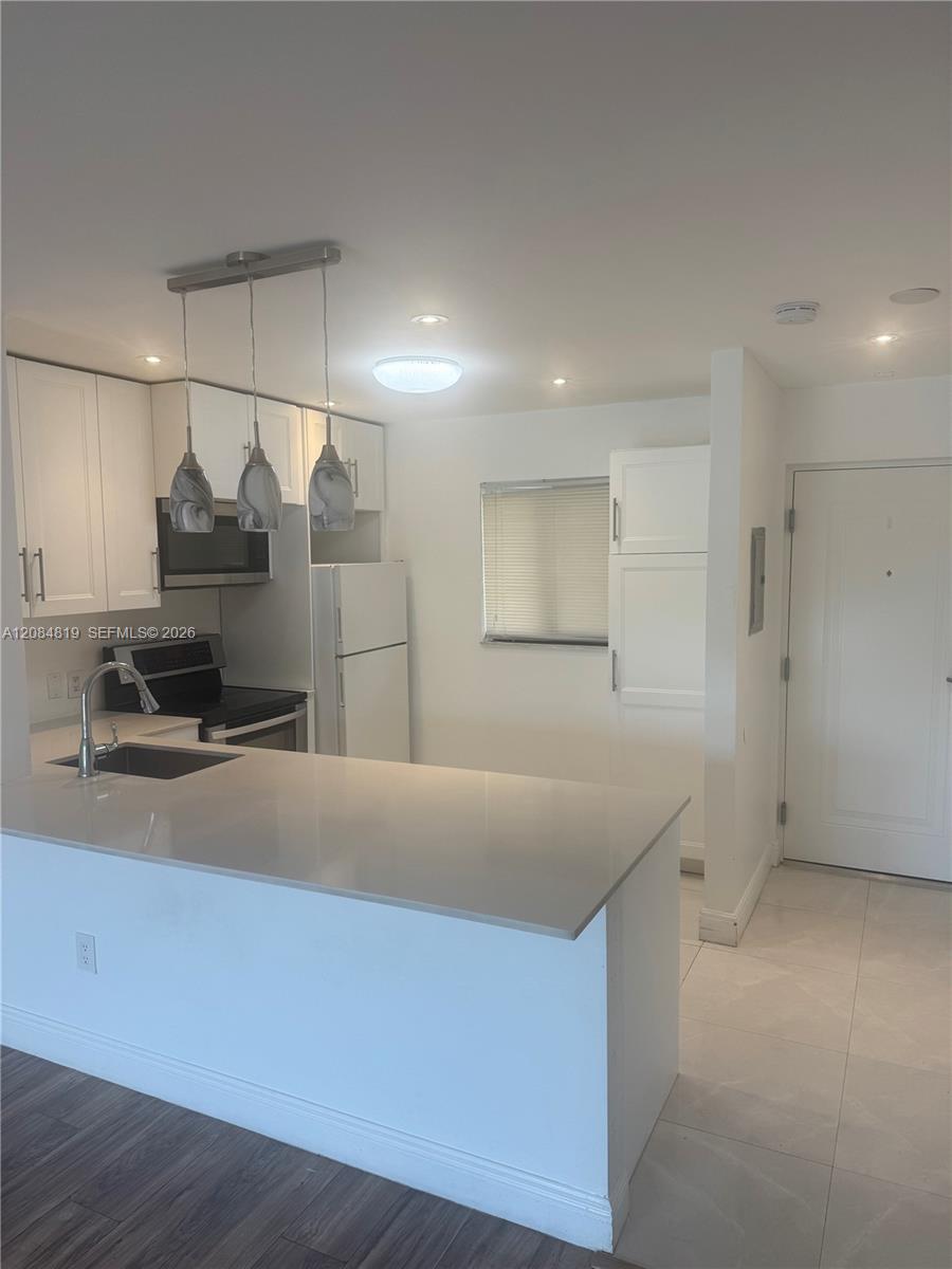 7810 Camino Real # 306 — Photo 2