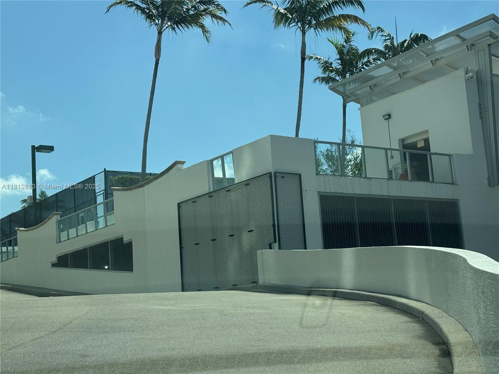 Ramp to lobby, guest parking and middle entrance parking.