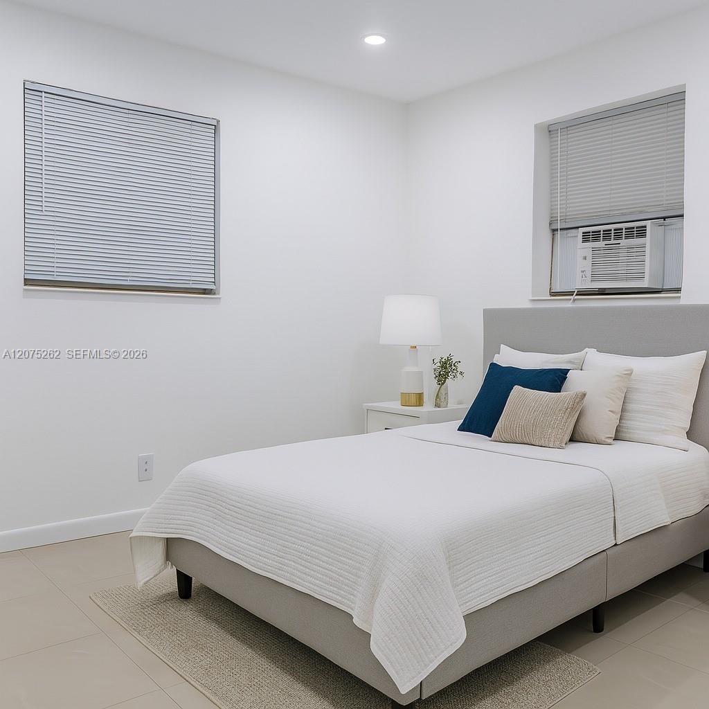 The unit is UNFURNISHED- This photo is VIRTUAL STAGED FOR VISUALIZATION