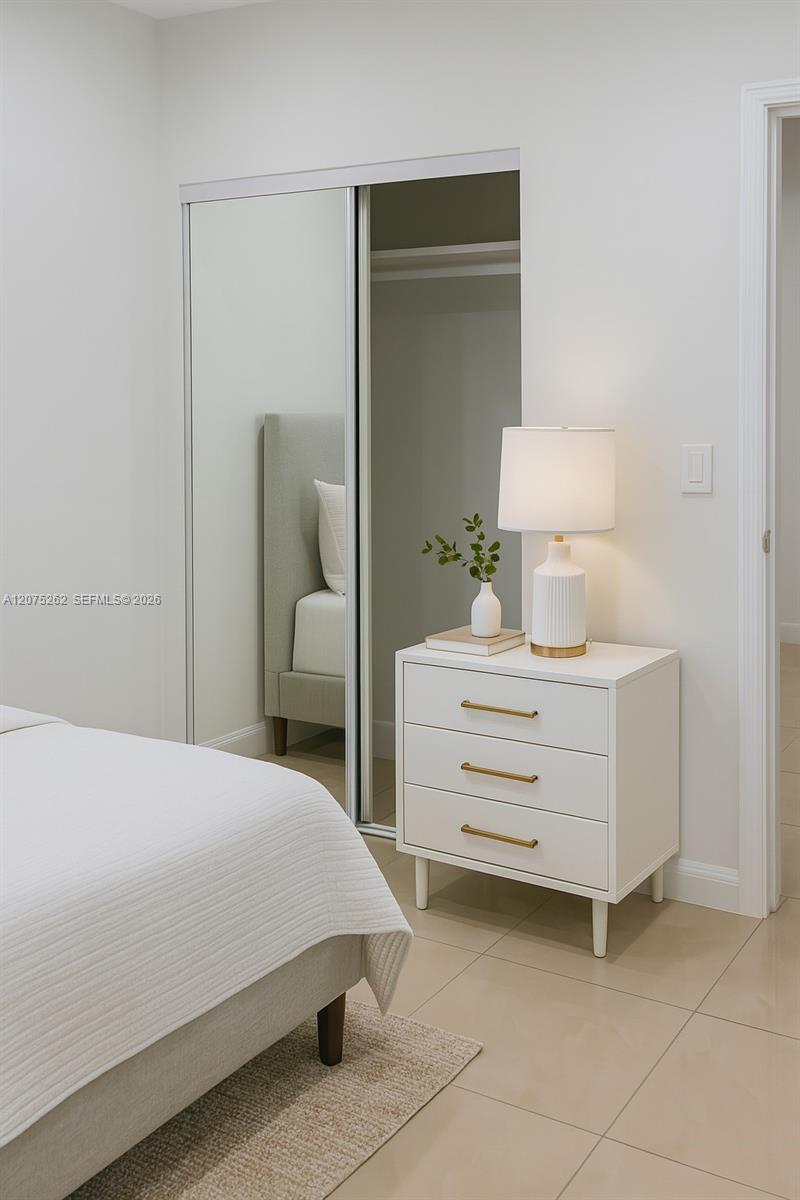 The unit is UNFURNISHED- This photo is VIRTUAL STAGED FOR VISUALIZATION