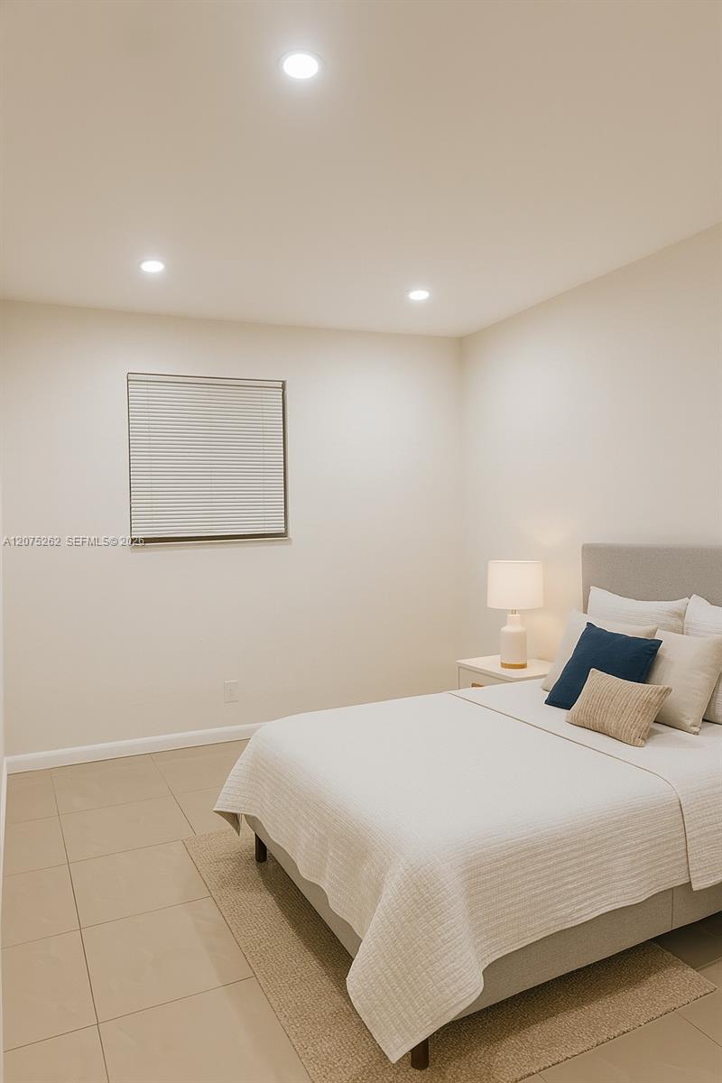 The unit is UNFURNISHED- This photo is VIRTUAL STAGED FOR VISUALIZATION
