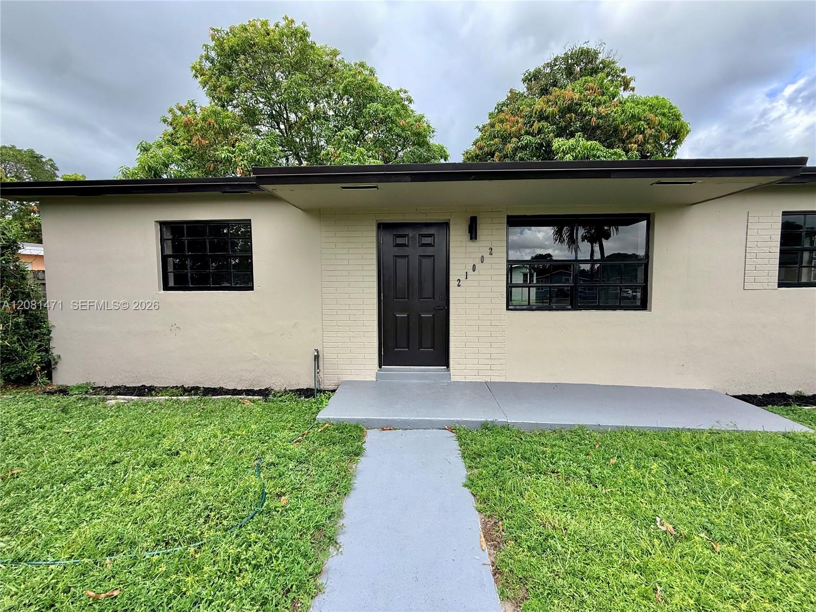 21002 NW 34th Ct — Photo 3